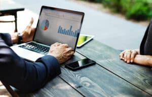 businessman reviewing reports with client