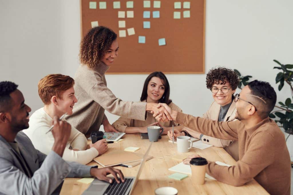 group-of-people-sitting-indoors-3184291