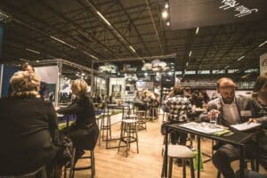 people sitting inside cafe at expo