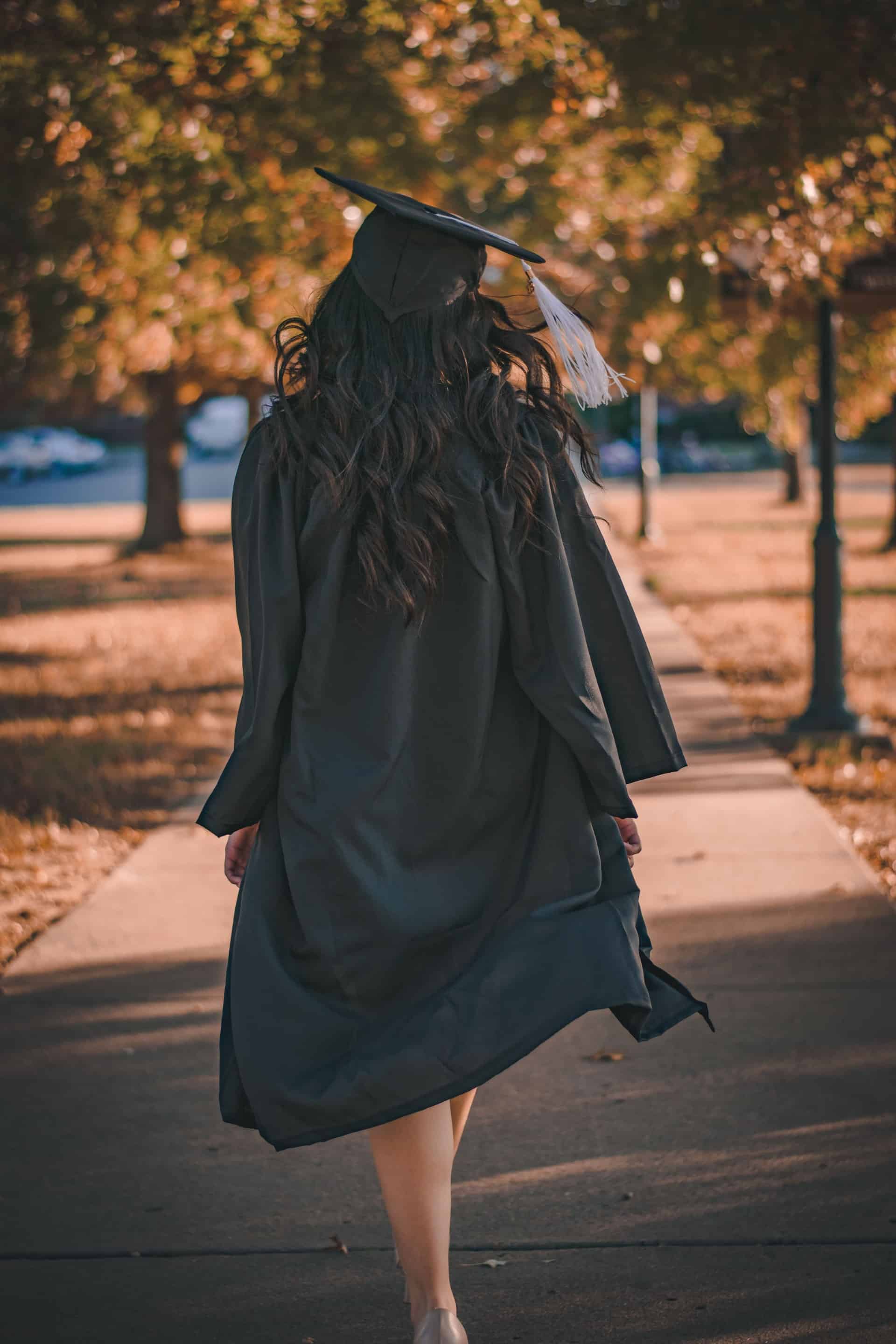 Female Indian Student Academic Gown Graduation Cap Holding Diploma Indian  Stock Photo by ©AndrewLozovyi 242669012